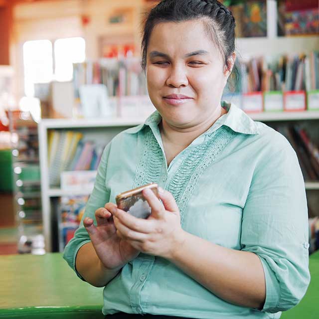 Young person holding a smart phone